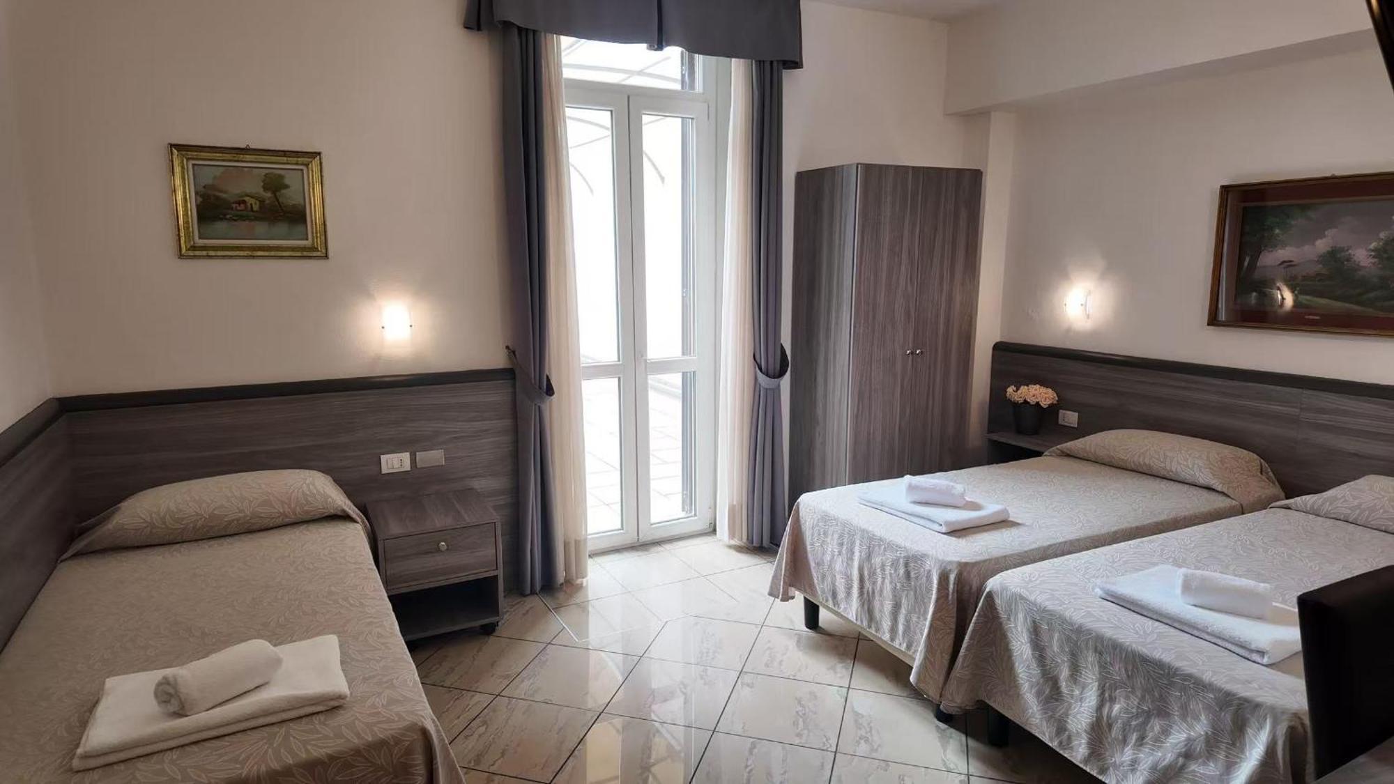 Quarto Triplo com Terraço